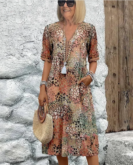 Livlig midilång klänning